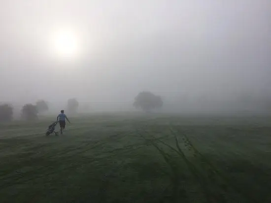 golf in sea fog
